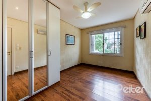 Casa em Condomínio à venda com 449m², 3 dormitórios, 3 suítes, 6 vagas, no bairro Terra Ville em PORTO ALEGRE