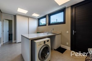 Casa em Condomínio à venda com 488m², 4 dormitórios, 4 suítes, 3 vagas, no bairro Alphaville em PORTO ALEGRE