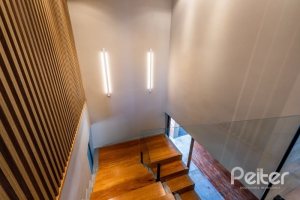 Casa em Condomínio à venda com 488m², 4 dormitórios, 4 suítes, 3 vagas, no bairro Alphaville em PORTO ALEGRE