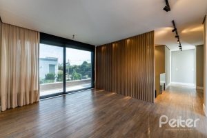 Casa em Condomínio à venda com 488m², 4 dormitórios, 4 suítes, 3 vagas, no bairro Alphaville em PORTO ALEGRE