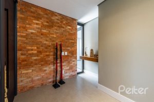 Casa em Condomínio à venda com 488m², 4 dormitórios, 4 suítes, 3 vagas, no bairro Alphaville em PORTO ALEGRE