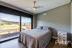 Casa em Condomínio à venda com 488m², 4 dormitórios, 4 suítes, 3 vagas, no bairro Alphaville em PORTO ALEGRE