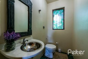 Casa em Condomínio à venda com 400m², 5 dormitórios, 2 suítes, 3 vagas, no bairro Cavalhada em PORTO ALEGRE