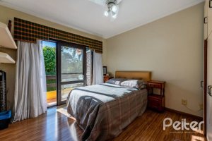 Casa em Condomínio à venda com 400m², 5 dormitórios, 2 suítes, 3 vagas, no bairro Cavalhada em PORTO ALEGRE