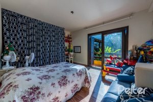 Casa em Condomínio à venda com 400m², 5 dormitórios, 2 suítes, 3 vagas, no bairro Cavalhada em PORTO ALEGRE