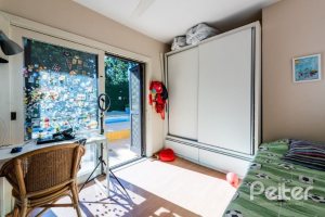 Casa em Condomínio à venda com 400m², 5 dormitórios, 2 suítes, 3 vagas, no bairro Cavalhada em PORTO ALEGRE