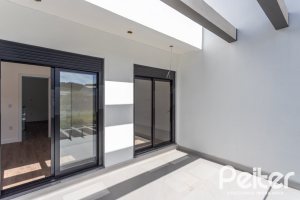 Casa em Condomínio à venda com 150m², 3 dormitórios, 3 suítes, 2 vagas, no bairro Hípica em PORTO ALEGRE