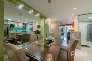 Casa em Condomínio à venda com 296m², 3 dormitórios, 1 suíte, 2 vagas, no bairro Vila Assunção em Porto Alegre