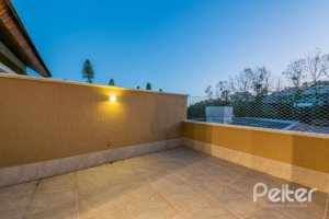 Casa em Condomínio à venda com 296m², 3 dormitórios, 1 suíte, 2 vagas, no bairro Vila Assunção em Porto Alegre