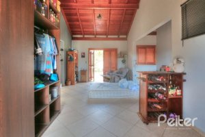 Casa à venda com 323m², 5 dormitórios, 3 suítes, 4 vagas, no bairro Tristeza em Porto Alegre