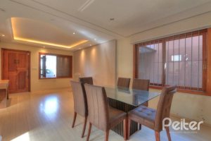 Casa à venda com 323m², 5 dormitórios, 3 suítes, 4 vagas, no bairro Tristeza em Porto Alegre