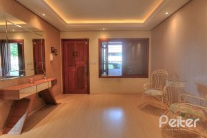 Casa à venda com 323m², 5 dormitórios, 3 suítes, 4 vagas, no bairro Tristeza em Porto Alegre