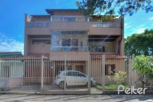 Casa à venda com 323m², 5 dormitórios, 3 suítes, 4 vagas, no bairro Tristeza em Porto Alegre