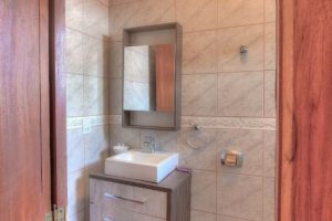 Casa à venda com 323m², 5 dormitórios, 3 suítes, 4 vagas, no bairro Tristeza em Porto Alegre