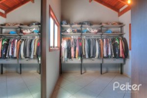 Casa à venda com 323m², 5 dormitórios, 3 suítes, 4 vagas, no bairro Tristeza em Porto Alegre