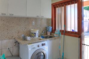 Casa à venda com 323m², 5 dormitórios, 3 suítes, 4 vagas, no bairro Tristeza em Porto Alegre