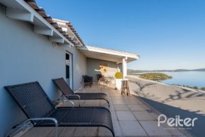 Casa à venda com 215m², 3 dormitórios, 1 suíte, 2 vagas, no bairro Sétimo Céu em Porto Alegre