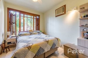 Casa em Condomínio à venda com 181m², 3 dormitórios, 1 suíte, 3 vagas, no bairro Tristeza em PORTO ALEGRE