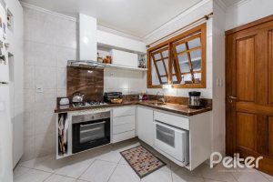 Casa em Condomínio à venda com 181m², 3 dormitórios, 1 suíte, 3 vagas, no bairro Tristeza em PORTO ALEGRE