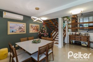 Casa em Condomínio à venda com 185m², 3 dormitórios, 1 suíte, 2 vagas, no bairro Vila Nova em PORTO ALEGRE