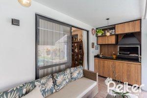Casa em Condomínio à venda com 185m², 3 dormitórios, 1 suíte, 2 vagas, no bairro Vila Nova em PORTO ALEGRE