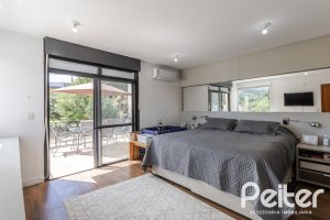 Casa em Condomínio à venda com 185m², 3 dormitórios, 1 suíte, 2 vagas, no bairro Vila Nova em PORTO ALEGRE