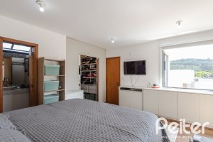 Casa em Condomínio à venda com 185m², 3 dormitórios, 1 suíte, 2 vagas, no bairro Vila Nova em PORTO ALEGRE