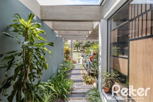 Casa em Condomínio à venda com 185m², 3 dormitórios, 1 suíte, 2 vagas, no bairro Vila Nova em PORTO ALEGRE
