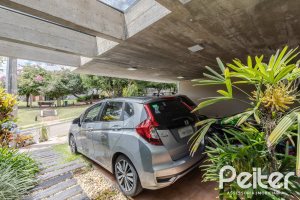 Casa em Condomínio à venda com 185m², 3 dormitórios, 1 suíte, 2 vagas, no bairro Vila Nova em PORTO ALEGRE