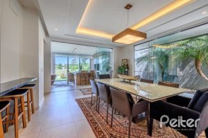 Casa em Condomínio à venda com 339m², 4 dormitórios, 4 suítes, 4 vagas, no bairro Terra Ville em PORTO ALEGRE