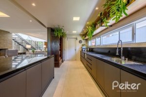 Casa em Condomínio à venda com 339m², 4 dormitórios, 4 suítes, 4 vagas, no bairro Terra Ville em PORTO ALEGRE