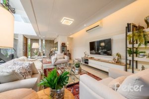 Casa em Condomínio à venda com 339m², 4 dormitórios, 4 suítes, 4 vagas, no bairro Terra Ville em PORTO ALEGRE