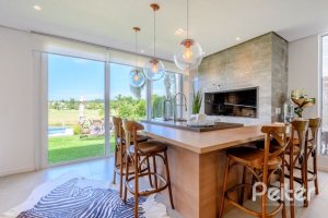 Casa em Condomínio à venda com 339m², 4 dormitórios, 4 suítes, 4 vagas, no bairro Terra Ville em PORTO ALEGRE