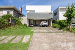 Casa em Condomínio à venda com 339m², 4 dormitórios, 4 suítes, 4 vagas, no bairro Terra Ville em PORTO ALEGRE