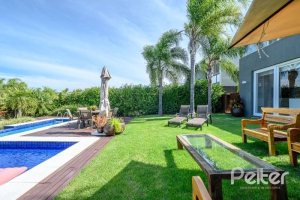 Casa em Condomínio à venda com 339m², 4 dormitórios, 4 suítes, 4 vagas, no bairro Terra Ville em PORTO ALEGRE
