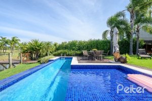 Casa em Condomínio à venda com 339m², 4 dormitórios, 4 suítes, 4 vagas, no bairro Terra Ville em PORTO ALEGRE