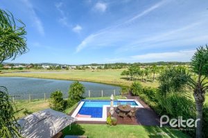 Casa em Condomínio à venda com 339m², 4 dormitórios, 4 suítes, 4 vagas, no bairro Terra Ville em PORTO ALEGRE