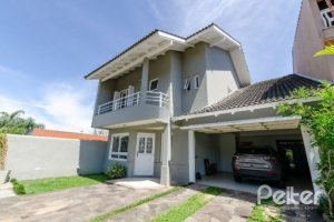 Casa à venda com 212m², 4 dormitórios, 1 suíte, 2 vagas, no bairro Espírito Santo em Porto Alegre