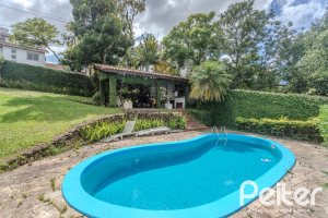 Casa à venda com 500m², 4 dormitórios, 2 suítes, 2 vagas, no bairro Vila Conceição em Porto Alegre