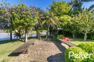 Casa em Condomínio à venda com 533m², 4 dormitórios, 2 suítes, 6 vagas, no bairro Terra Ville em PORTO ALEGRE