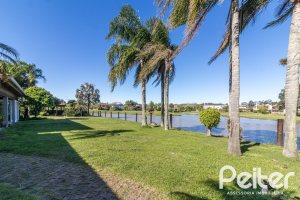 Casa em Condomínio à venda com 533m², 4 dormitórios, 2 suítes, 6 vagas, no bairro Terra Ville em PORTO ALEGRE