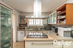 Casa em Condomínio à venda com 533m², 4 dormitórios, 2 suítes, 6 vagas, no bairro Terra Ville em PORTO ALEGRE