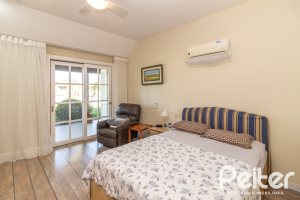 Casa em Condomínio à venda com 533m², 4 dormitórios, 2 suítes, 6 vagas, no bairro Terra Ville em PORTO ALEGRE