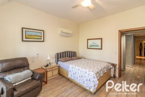 Casa em Condomínio à venda com 533m², 4 dormitórios, 2 suítes, 6 vagas, no bairro Terra Ville em PORTO ALEGRE