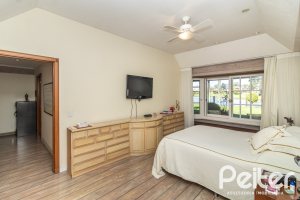 Casa em Condomínio à venda com 533m², 4 dormitórios, 2 suítes, 6 vagas, no bairro Terra Ville em PORTO ALEGRE