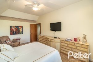 Casa em Condomínio à venda com 533m², 4 dormitórios, 2 suítes, 6 vagas, no bairro Terra Ville em PORTO ALEGRE