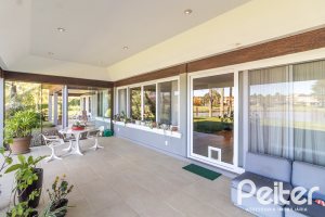 Casa em Condomínio à venda com 533m², 4 dormitórios, 2 suítes, 6 vagas, no bairro Terra Ville em PORTO ALEGRE