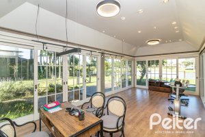 Casa em Condomínio à venda com 533m², 4 dormitórios, 2 suítes, 6 vagas, no bairro Terra Ville em PORTO ALEGRE