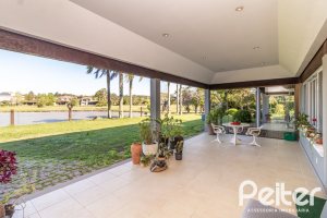 Casa em Condomínio à venda com 533m², 4 dormitórios, 2 suítes, 6 vagas, no bairro Terra Ville em PORTO ALEGRE