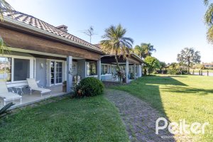 Casa em Condomínio à venda com 533m², 4 dormitórios, 2 suítes, 6 vagas, no bairro Terra Ville em PORTO ALEGRE